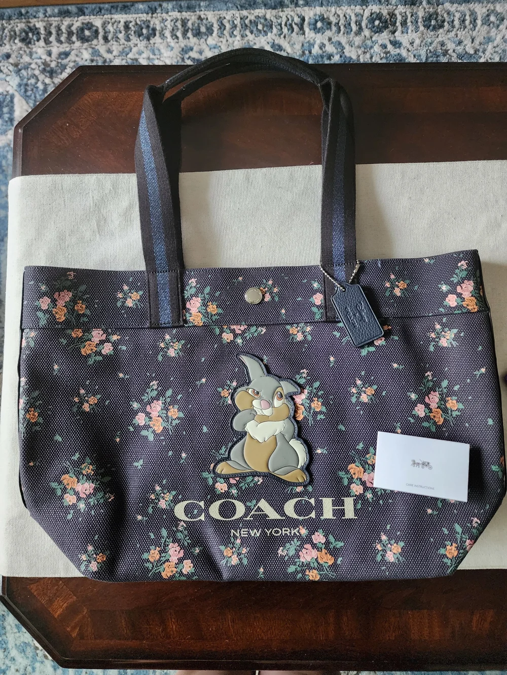 NWOT Limited Edition Disney/Coach Navy Floral Tote with Thumper Patch